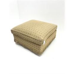 Square footstool upholstered in pale patterned fabric 