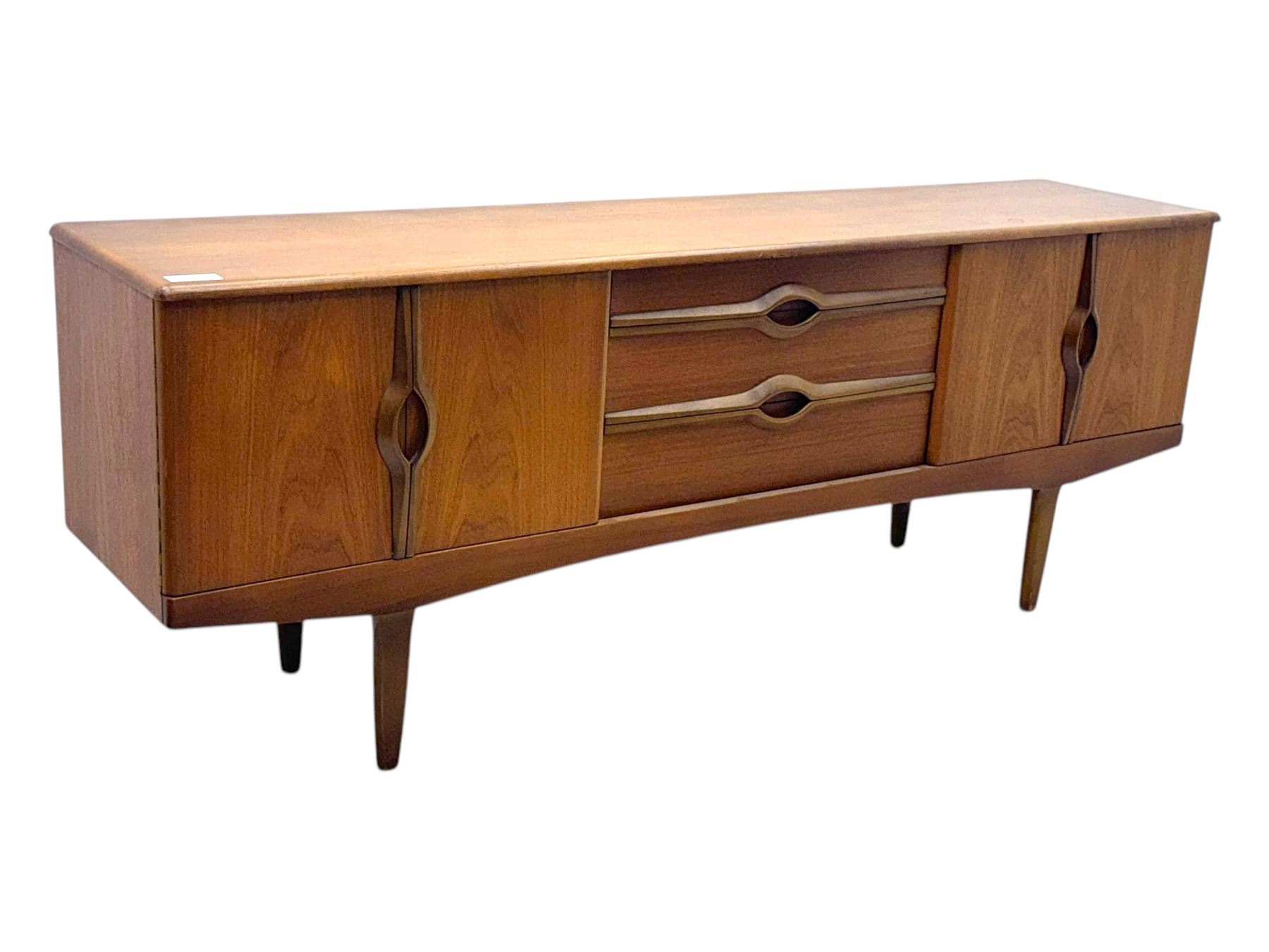 Stonehill - mid-20th century teak sideboard, three central drawers flanked by concertina cupboard doors, on tapering supports