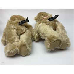 Group of five teddy bears comprising ‘George’ a unique pellet filled bear with glass eyes and velvet paws H38cm, and ‘Abbey’ a luxury German plush with wobble head and glass eyes no.5/10 H24cm, both with Teddies from Bearyland labels; along with two light blonde mohair H. M. Bears and Boyds Bears ‘T. F. Wuzzies’ no. 595140 (5)