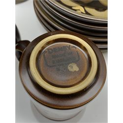 Denby Arabesque patter tea and dinner wares, comprising six dinner plates, twelve side plates, six twin handled bowls and covers, two tureen and covers, four oval serving platters, coffee pot, water jug, milk jug, cream jug, sucrier and cover, and eight coffee cans. 