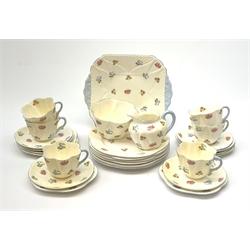 A Shelley part tea set, decorated with pansies, roses and forget-me-nots, pattern 13424, comprising six teacups and six saucers, six side plates, six dessert plates, open sucrier, milk jug, and sandwich plate. 