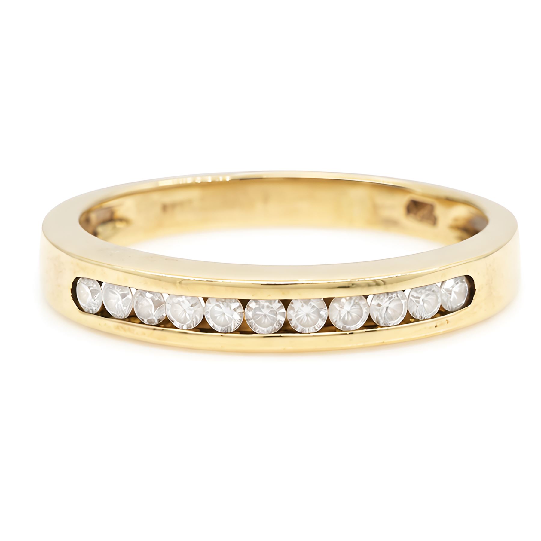18ct gold diamond half eternity ring, channel set with eleven round brilliant cut diamonds, London 2002, total diamond weight approx 0.35 carat