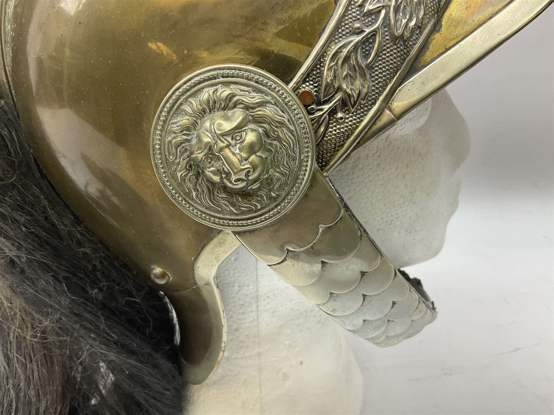 French Model 1913 mounted gendarmerie helmet; brass bodied with nickel mounts, chin strap, comb and horse-hair H27cm (no liner)