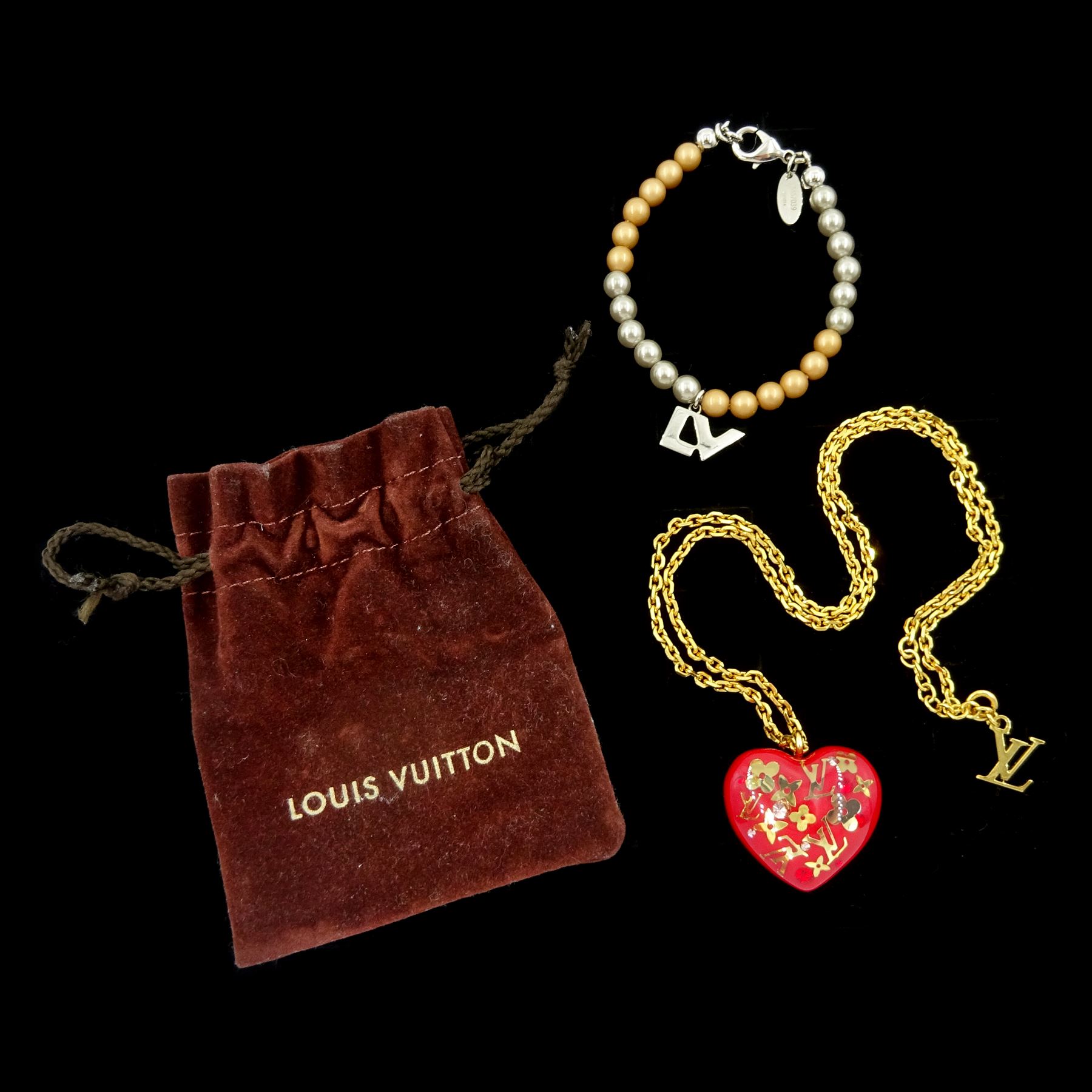 Louis Vuitton Pomme D'Amour monogram Inclusion heart pendant necklace, with pouch and a Louis Vuitton bead bracelet