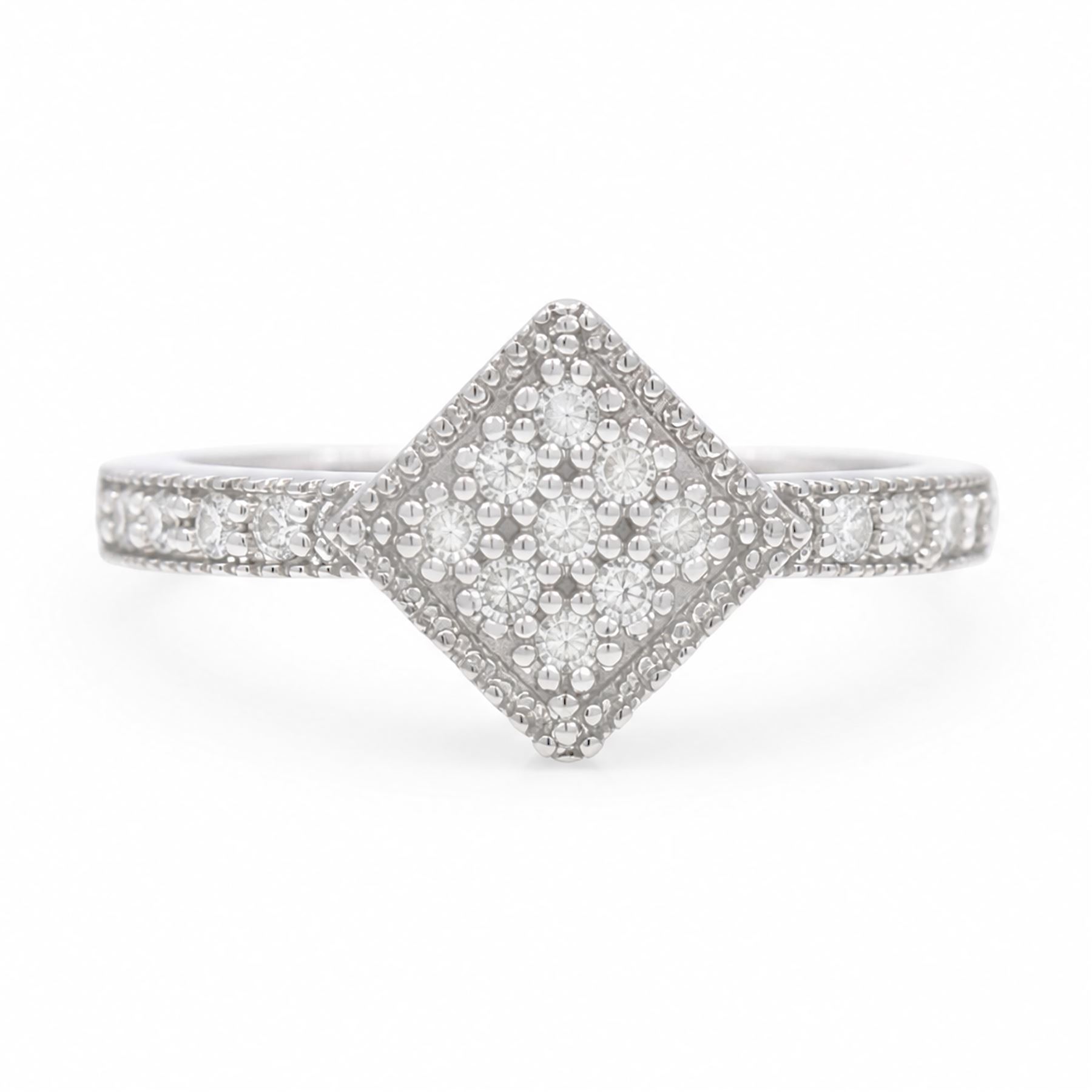 9ct white gold diamond shaped diamond ring, pave set with nine round cut diamonds, with diamond set shoulders, Birmingham 2006