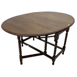 Early 20th century oak barley twist drop leaf dining table (105cm x 154cm, H74cm), and four chairs 