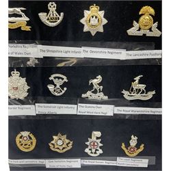Collection of thirty-two reproduction military badges, including Royal Scots Fusiliers, Royal Lincolnshire Regiment, The Boarders Regiment etc. 
