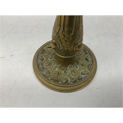 Palmer & Co of London Gothic brass altar candle stick, late 19th century brass pedestal dish of pierced design decorated with classical figures, Neptune and sea horses, two ornate brass photo frames and an oval brass dish stamped ‘Peerage’