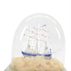 Victorian glass frigger of a three mast ship and a smaller ship under a glass dome, H38cm