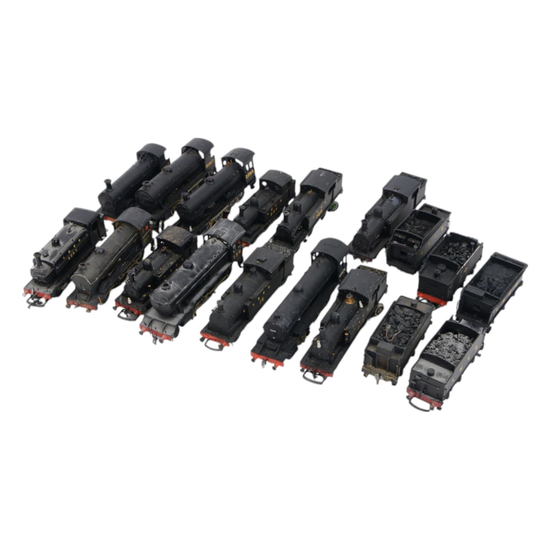 Thirteen 00 gauge kit built locomotives and five kit built tenders