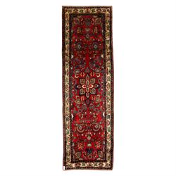 North West Persian Mahal hand-knotted runner, deep red ground, with a vertical arrangement...