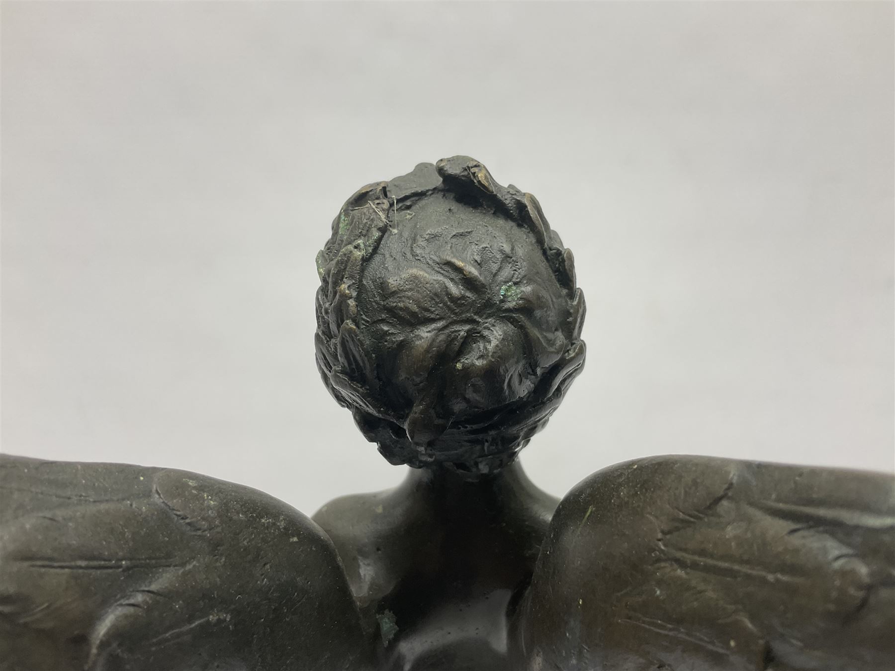 After Moreau, bronzed figure modeled as an angel holding a bow, with foundry mark upon socle base, H30cm