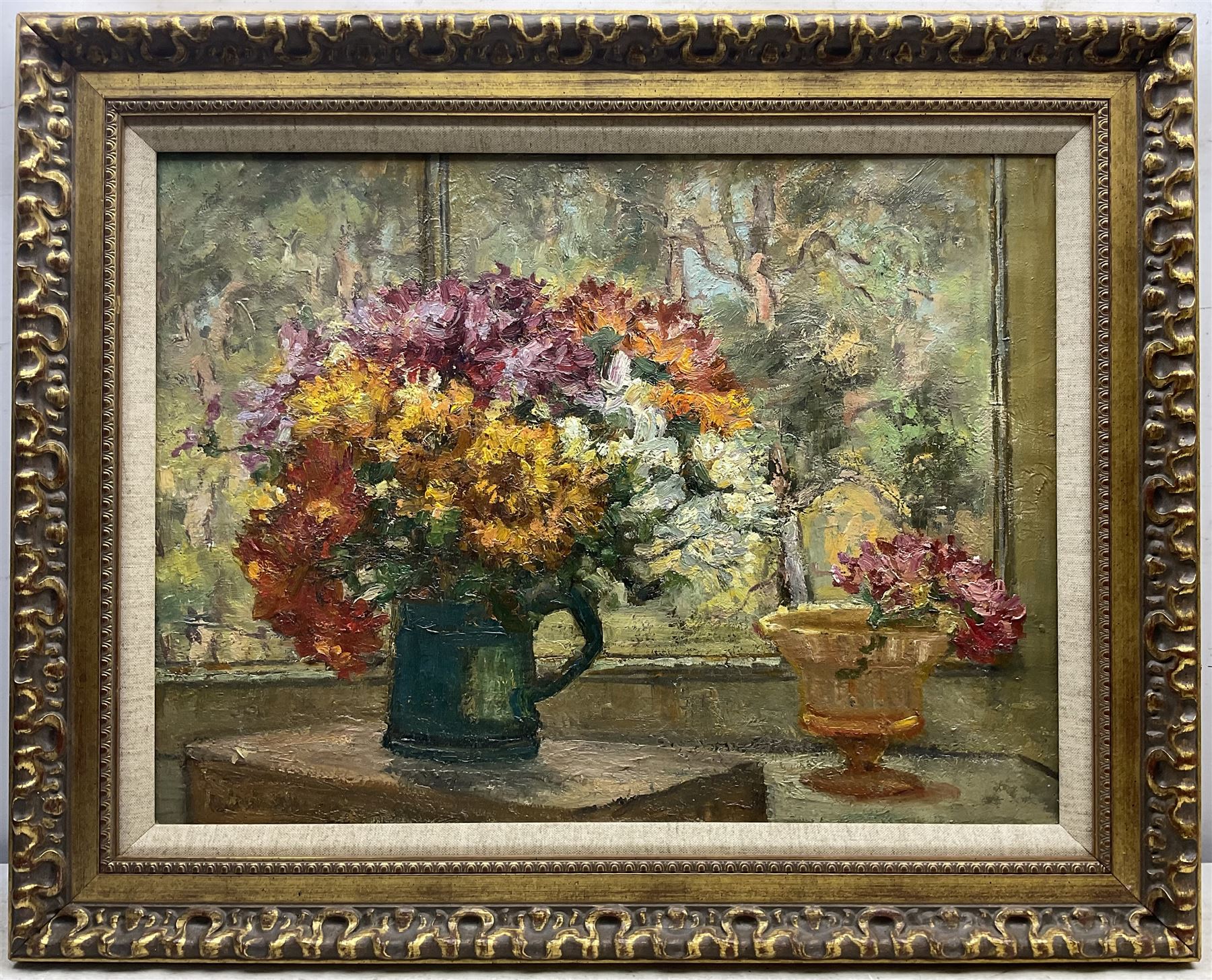 St Ives School (Early 20th century): Still Life - Flowers in a Jug, oil on canvas unsigned, with 'James Lanham, Artist's Colourman, St Ives Cornwall' metal label to stretcher 44cm x 60cm