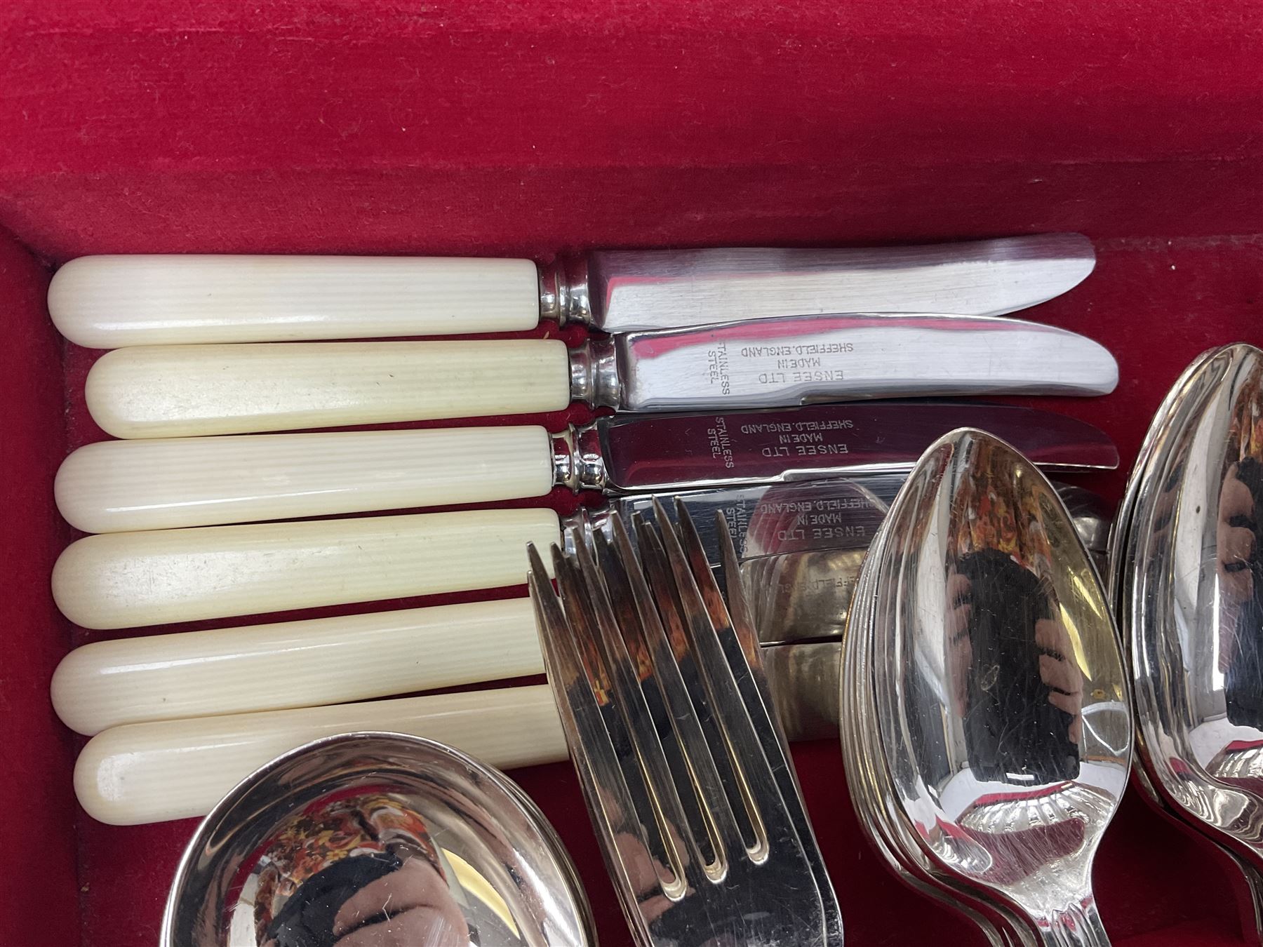 Canteen of King's pattern cutlery for six place settings by James Ryals of Sheffield, with two extra forks, pair of salad servers and six fish knives, all within fitted wooden case, together with six ivorine handled butter knives and six silver plated cake forks