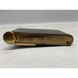 Art Deco camera shaped lady's musical compact and cigarette case, probably German, with green marble effect panels and gilt highlights, with large hinged opening to reveal engine turned brass interior with cigarette or lipstick holders, and the other side with musical mechanism and flip action powder compartment with mirror, L10cm