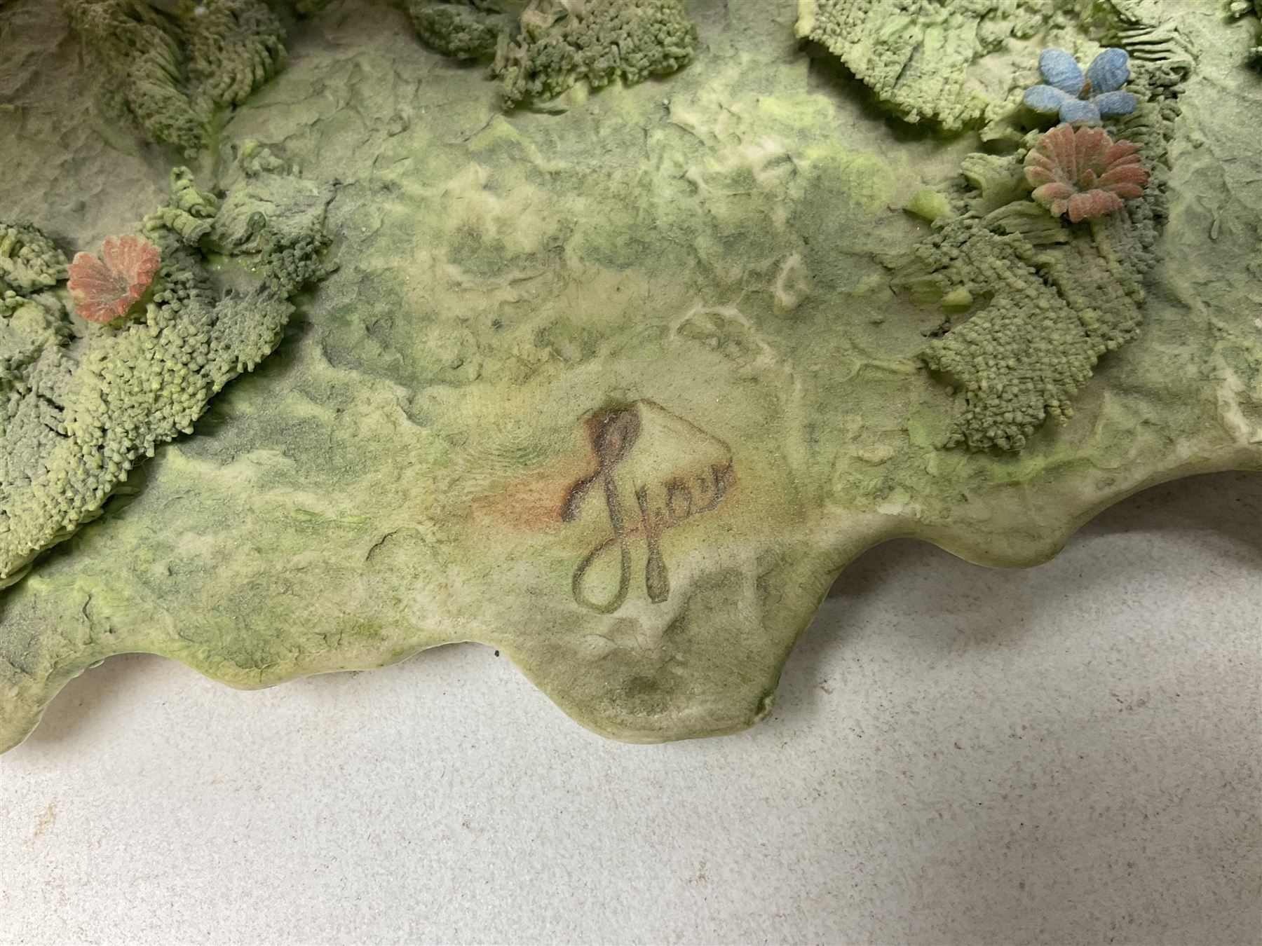 Two Capodimonte figures, comprising The Watchmaker by Curiase and Tramp Seated on a Bench, created by D.Bonalberti, tallest example H24cm