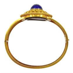 Victorian 18ct gold enamel and seed pearl hinged bangle and matching brooch, each star set with a seed pearl and blue enamel dome within a circular cannetille frame, each with a glazed panel verso, the hinged bangle with foliate engraved decoration, in fitted case