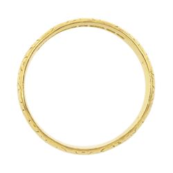 22ct gold wedding band, with engraved foliate decoration, Birmingham 1956