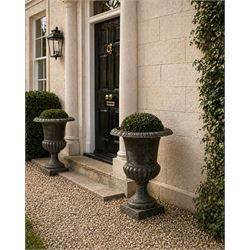 Pair of Victorian design heavy cast iron garden urns, black painted, egg and dart rim on w...