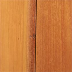 G Plan - 'Fresco' teak double wardrobe, twin doors enclosing a single clothes rail, on a recessed plinth base with castors beneath  