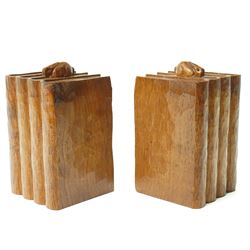 Rabbitman - pair of adzed oak bookends, each carved as a set of four books, with carved ra...