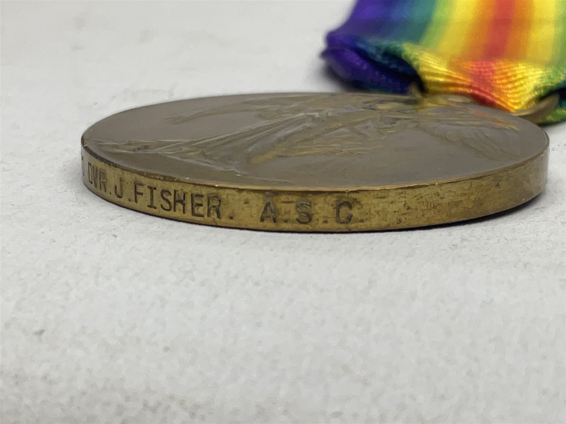 WW1 group of three medals comprising British War Medal, 1914-15 Star and Victory Medal awarded to 1270 Dvr. J. Fisher A.S.C.; and Territorial Efficiency Medal to T4-214571 Dvr. J. Fisher R.A.S.C.; all with ribbons (4)