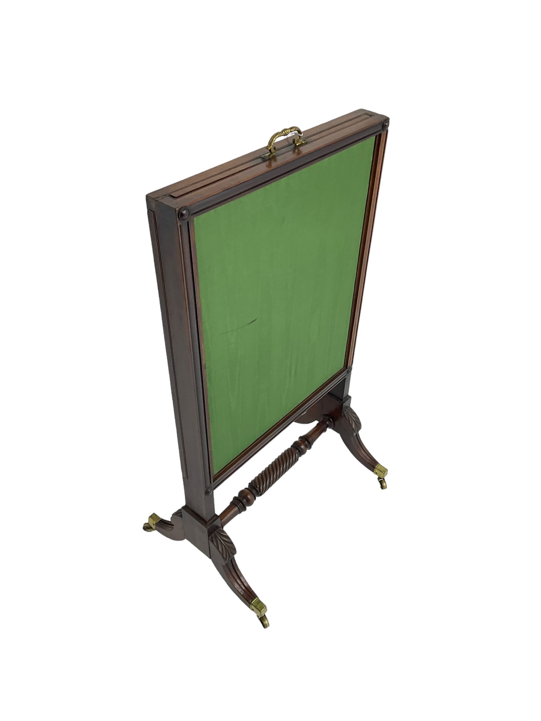 Regency mahogany screen with two horizontal and one vertical pull-out panels, on base with carved sabre legs and rope-twist stretcher