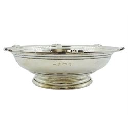 1940's silver footed bowl, the stepped rim detailed with stylised motifs, upon a circular stepped foot, hallmarked G Bryan & Co, Birmingham 1941, D23.5cm, approximate weight 18.77 ozt (584 grams)