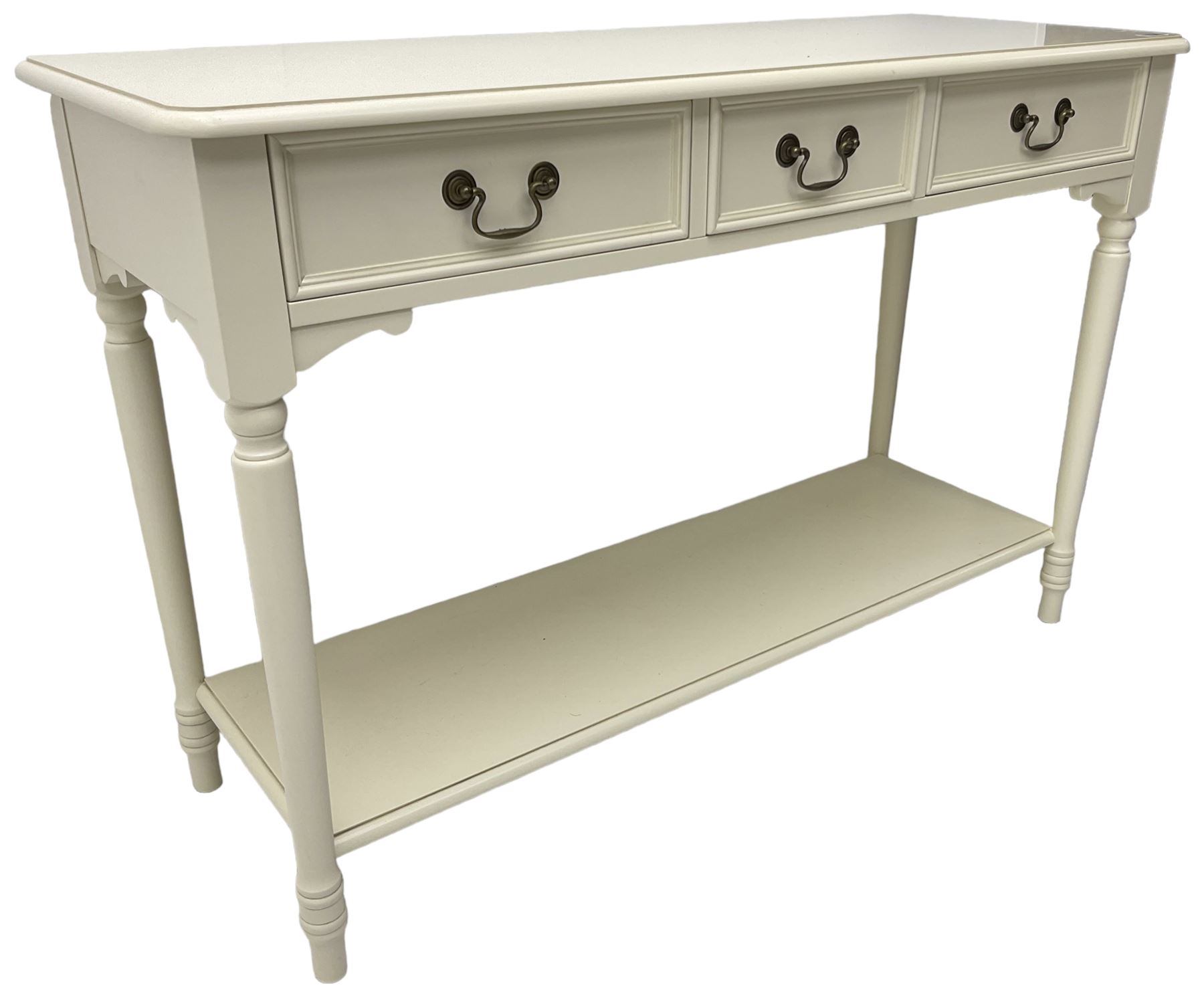 Laura Ashley - 'Clifton' ivory finish three drawer console table, fitted with three frieze drawers with heavily moulded edges, raised on turned supports united by undertier