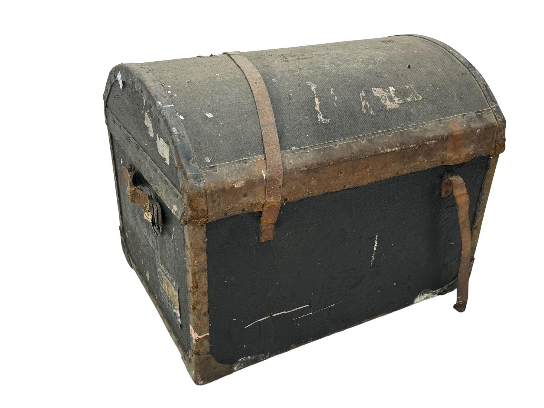 Early 20th century travel trunk, domed top with leather straps and metal rivet detailing, wooden frame with black canvas covering, interior lined with striped fabric, manufacturers mark to the inside 