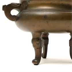 19th century Chinese bronze censer with loop handles and on shaped supports D13cm and an Asian bronze bell H17cm