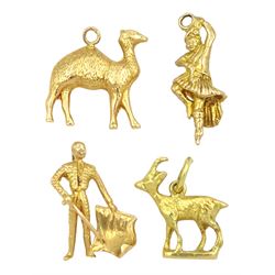 Three 18ct gold pendant / charms including matador, camel and goat and a 9ct gold dancer