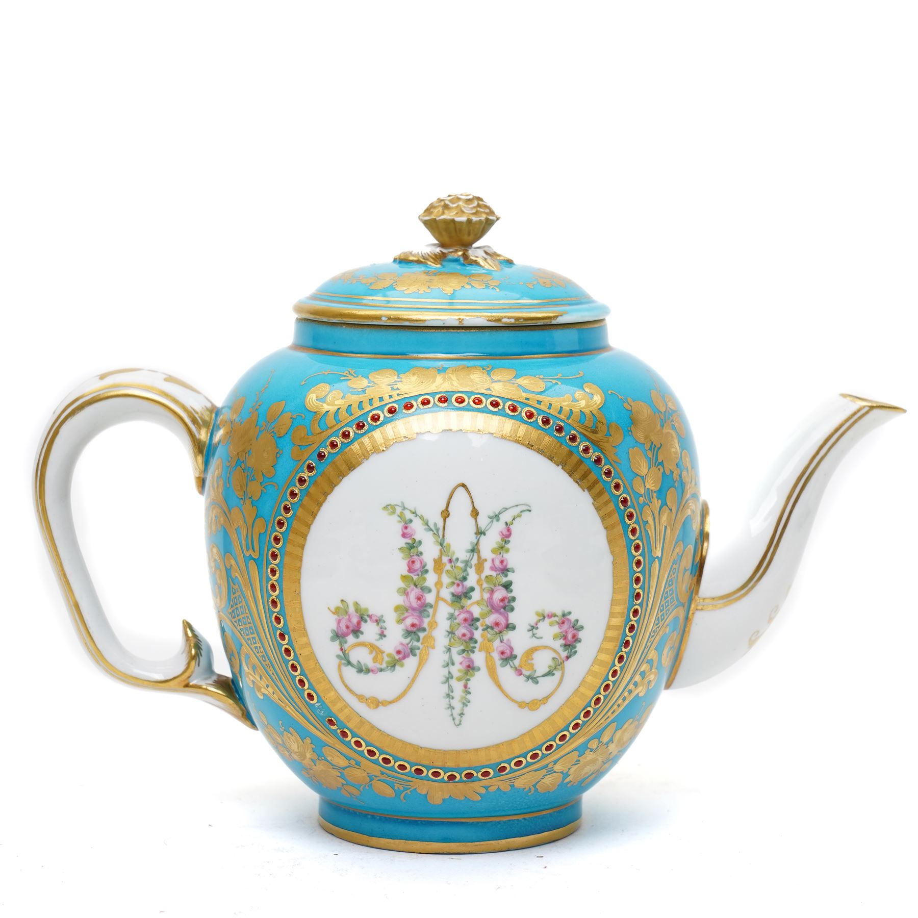 Sevres dejeuner 'Bleu turquoise' tea service for six covers, decorated by Charles-Eloi Asselin, comprising six teacups and saucers, teapot, milk jug and covered sucrier, the bleu de ciel ground painted with portraits of the French courtiers, each piece with name to base (some rubbed) of those depicted, to include Marie Antoinette (teapot), Madame de Montesson, Madame du Barry, Madam de Genlis, Madame Elizabeth (sucrier), Madame de Lamballe (milk jug) Madame Victoire, and two others unidentified, within finely painted gilt surround, each portrait encircled by red jewelled borders, the saucers with corresponding monograms within similar floral gilt and jewelled borders, Sevres mark to base with painted 'ee', dating these 1782, teapot H14cm 