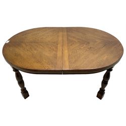 20th century oak dining table, oval top over turned supports