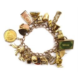  9ct gold bracelet with 24 charms, hallmarked 9ct and a 1900 half sovereign loose mounted, approx 63.1gm  