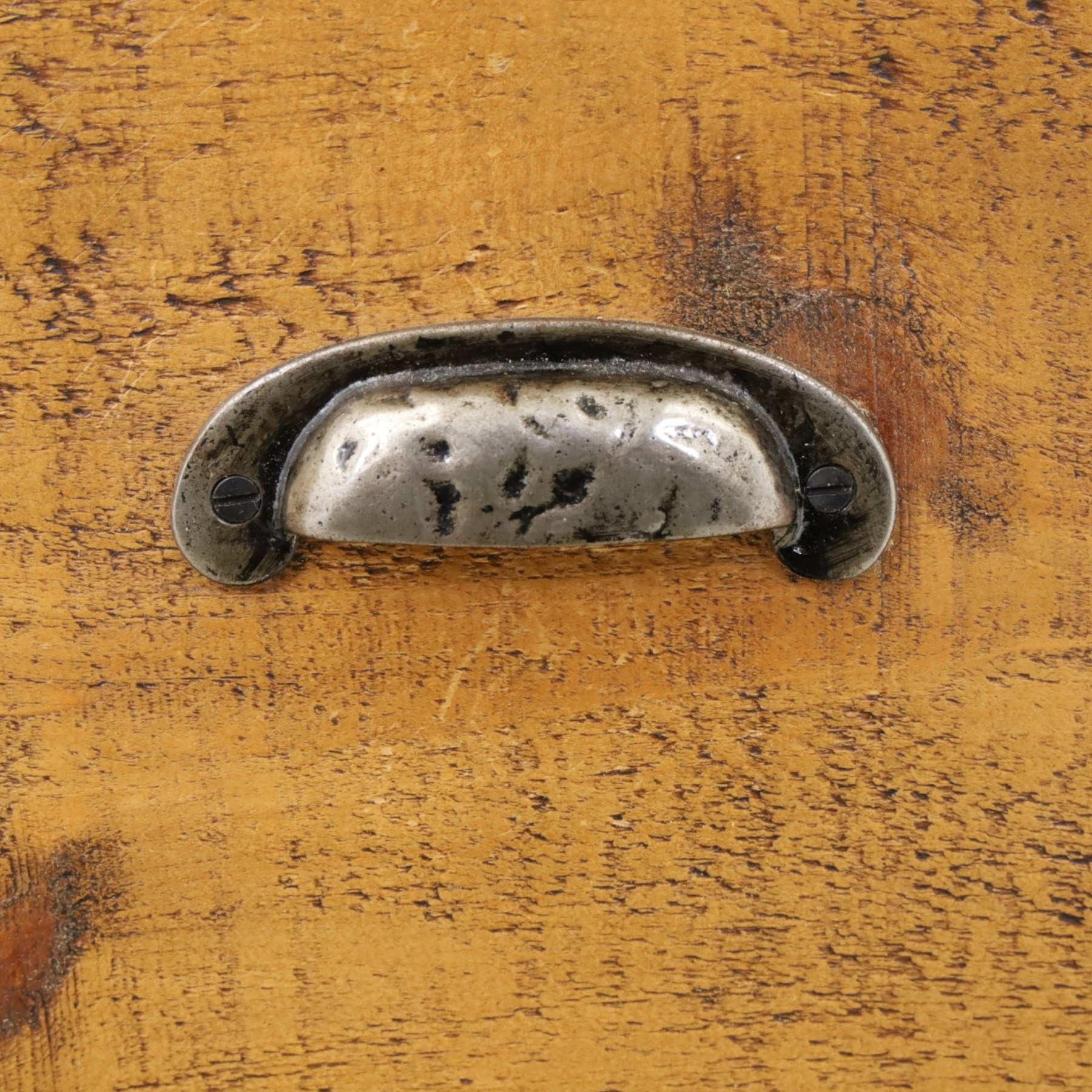 Indigo Furniture - large rustic oak cupboard with faux-drawer fronted cupboard, rectangular top above a cupboard door to the left with latch, a bank of four drawers to the right, metal cup handles raised on shaped supports