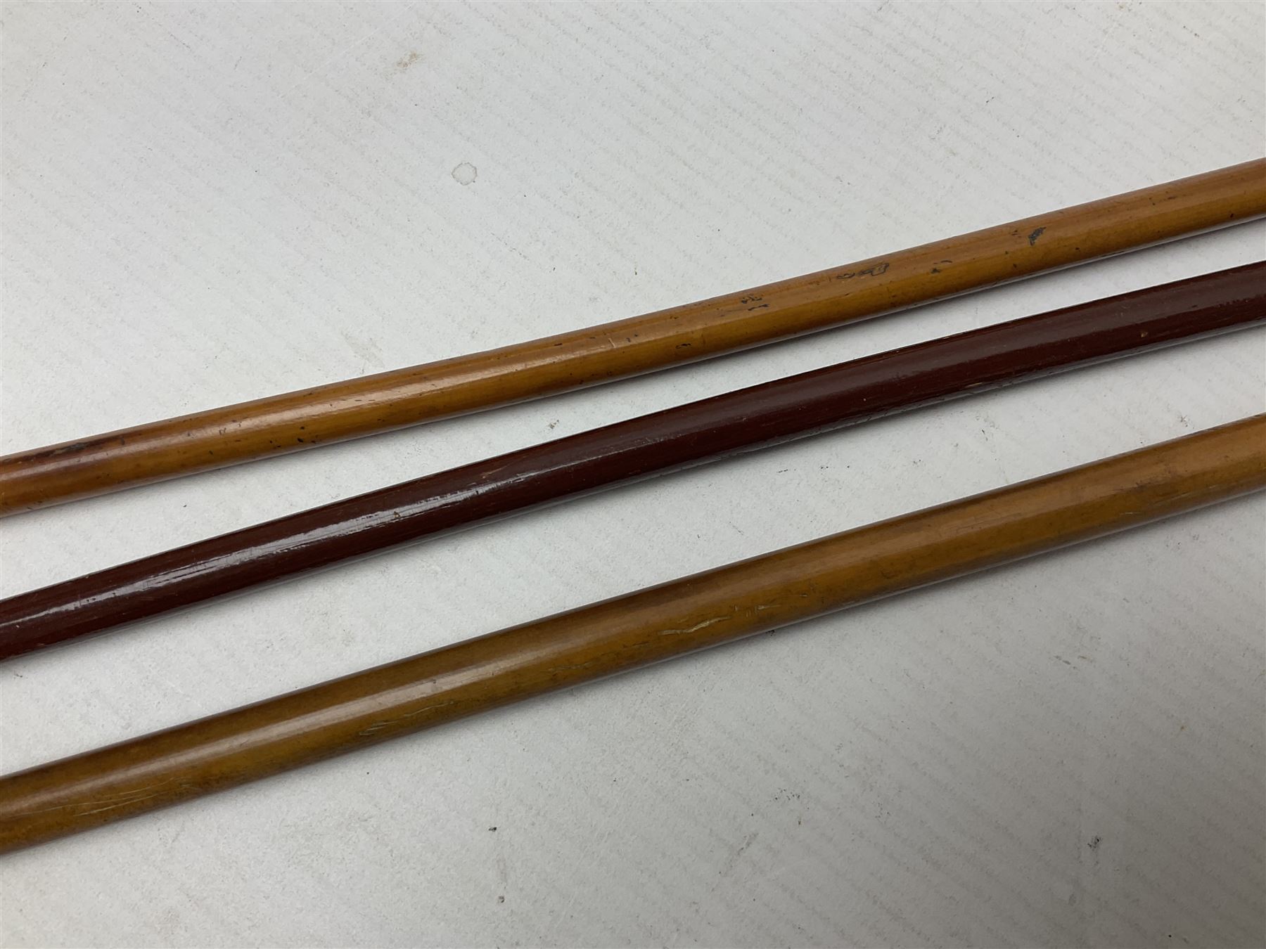 Three malacca cane swagger sticks - Duke of York's Royal military School L68cm; RAMC; and another embossed with a lion to the terminal (3)