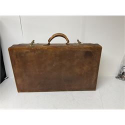Three vintage leather suitcases, two with stamped lettering to covers, largest H39cm