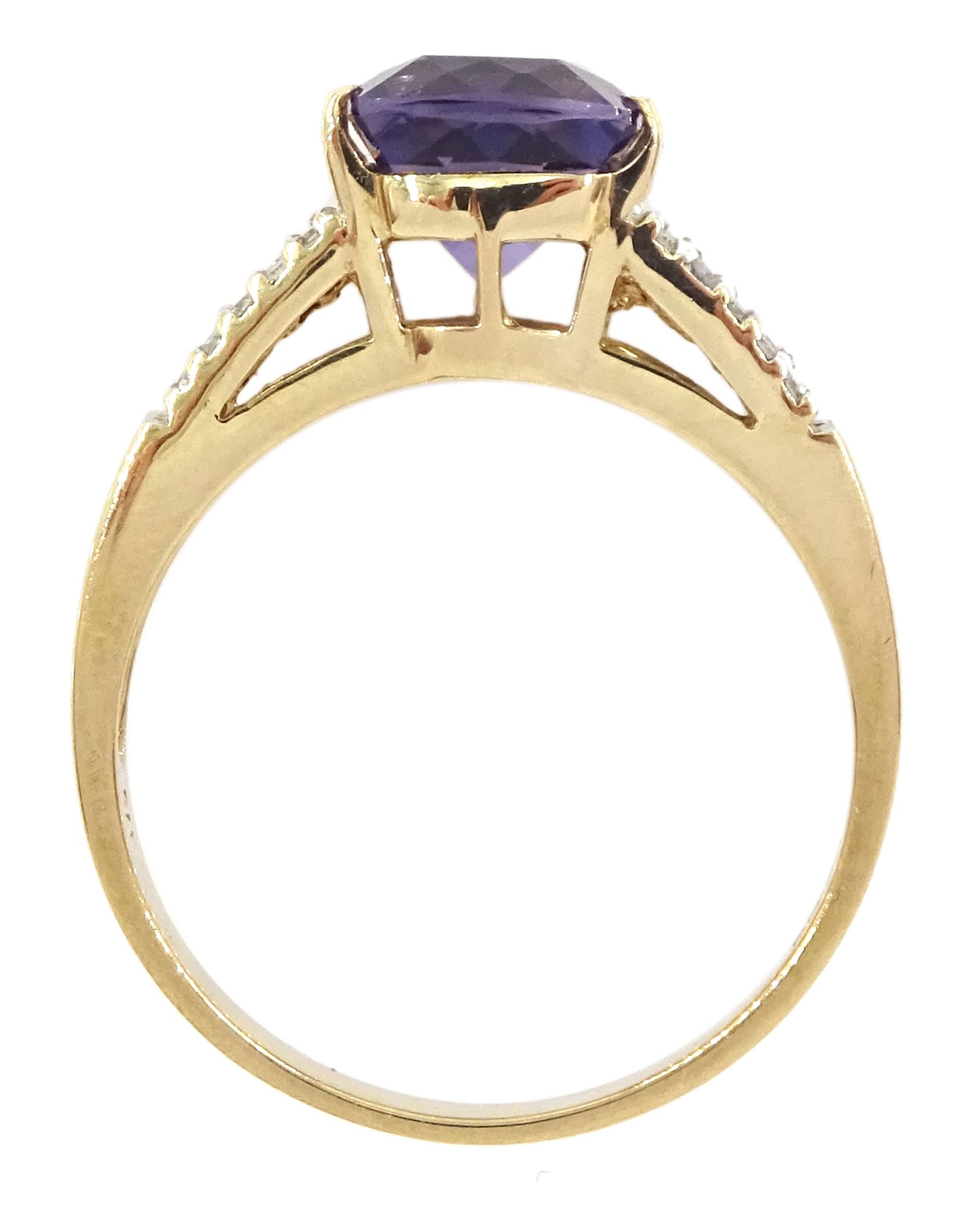 9ct gold single stone cushion cut amethyst ring, with diamond set shoulders, hallmarked