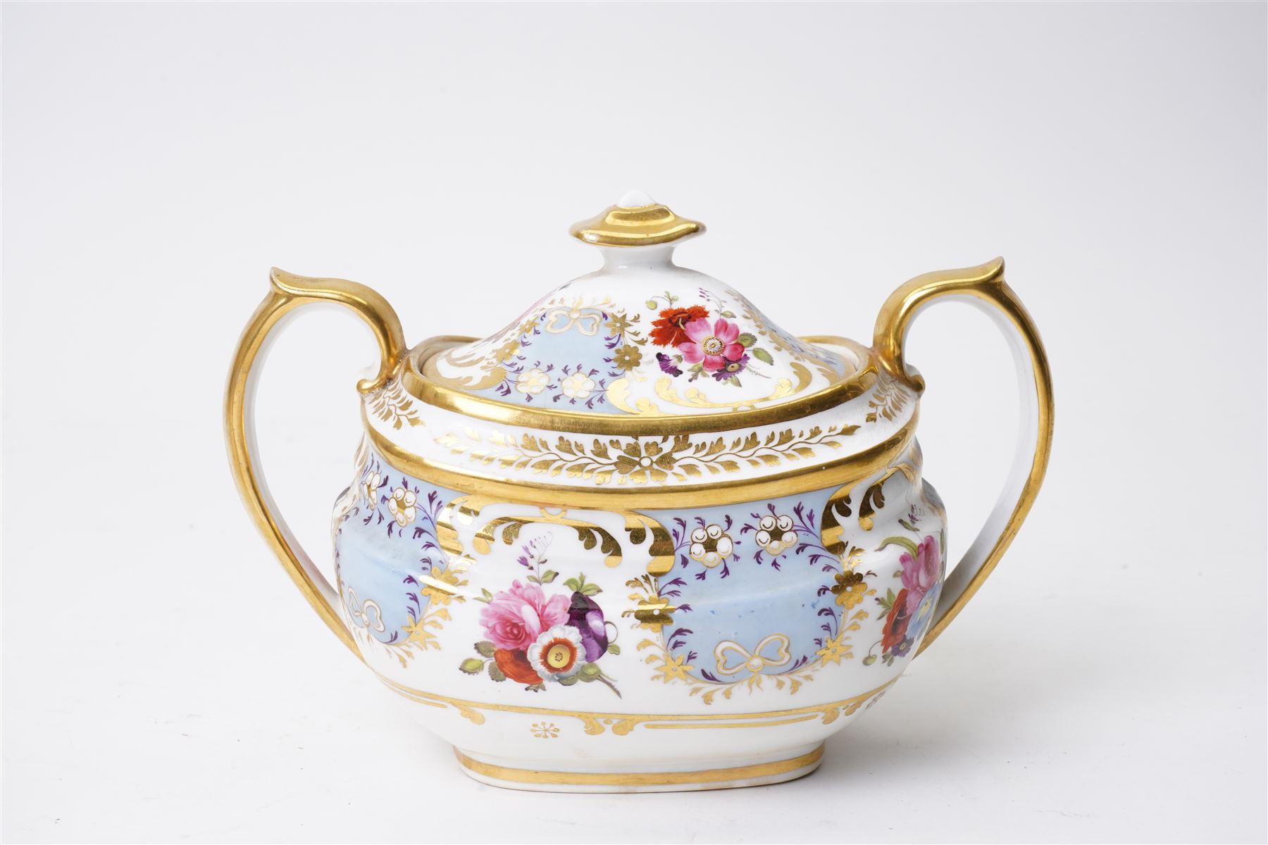Brown-Westhead, Moore & Co cabinet cup and saucer, with rope twist moulded handle, hand-painted with floral reserves against a white and sky blue ground, heightened profusely with gilt, together with a pink hand-painted example, and a 19th century spill vase and twin-handled covered sucrier (4)