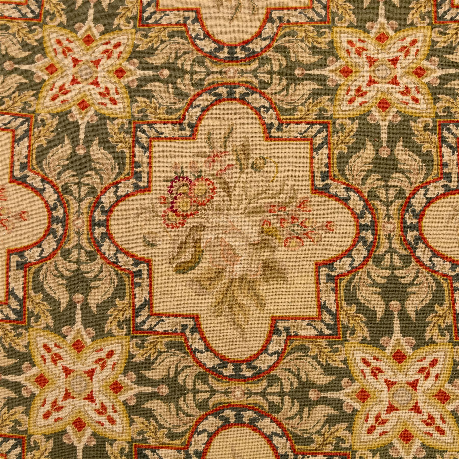 Late 20th-century Aubusson-style woven tapestry of rectangular form, woven with an all-over repeating arrangement of cream quatrefoil cartouches, each enclosing a stylized floral spray with an olive green scrolling foliate ground, interspersed with star motifs 