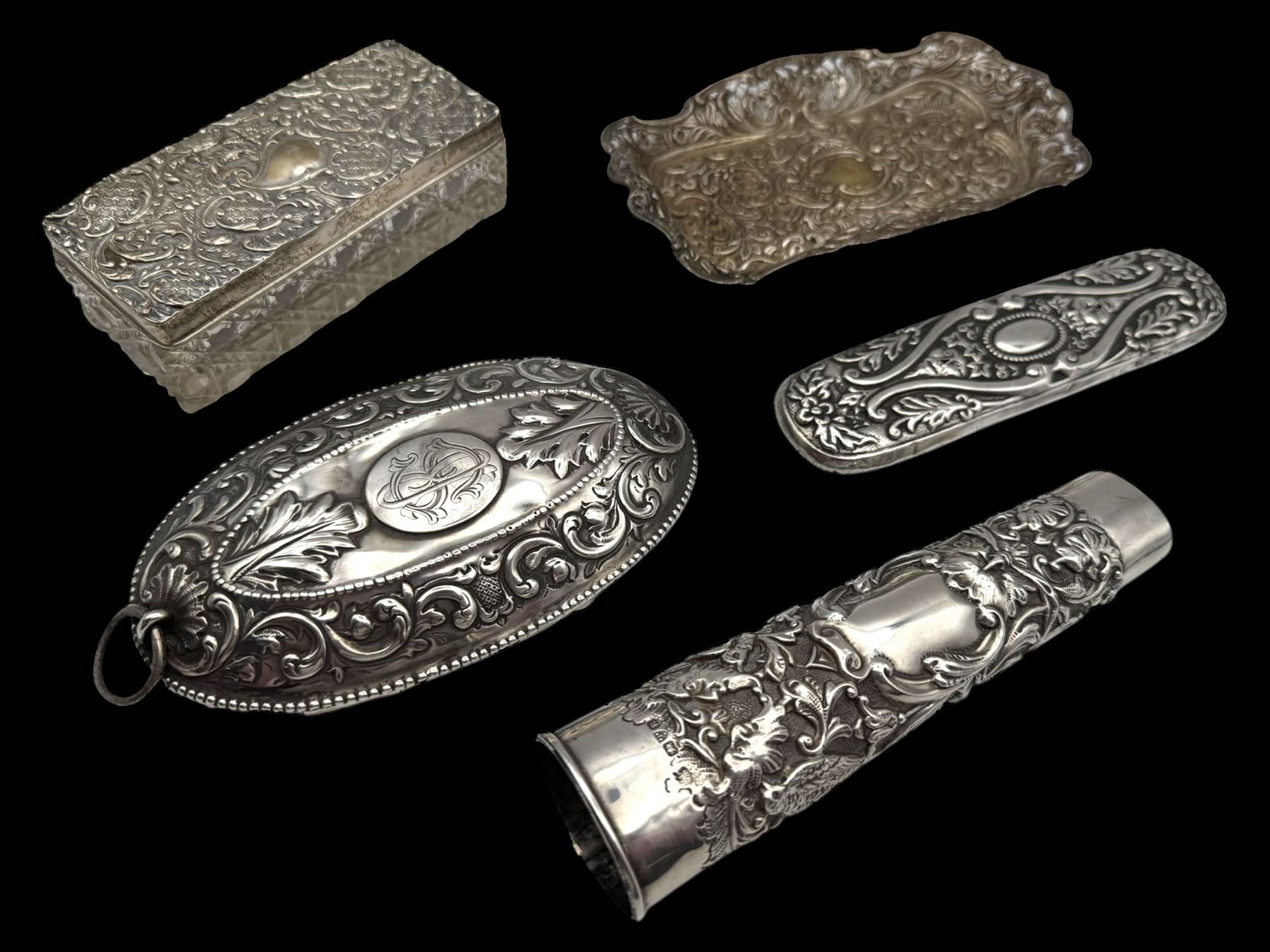 Group of silver, including glass jar with silver lid, pierced pin tray, vase sleeve and two silver lids, all hallmarked 