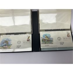 Mostly Queen Elizabeth II Great British first day covers, many with printed address and special postmarks, housed in various ring binder folders and United States of America 'The Official Birds and Flowers of Our Fifty States' first day cover collection