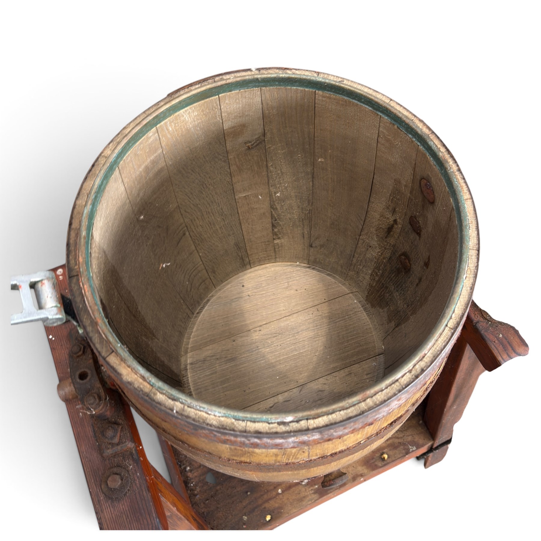 Two early 20th century dairy equipment items: Waide & Sons, Leeds – oak barrel butter churn with iron bands, later converted to electric operation, on trestle stand (W71cm H115cm); Lister – ‘Ball Bearing’ cast iron cream separator, with hopper and foot pedal, in red-painted finish (W47cm H49cm)