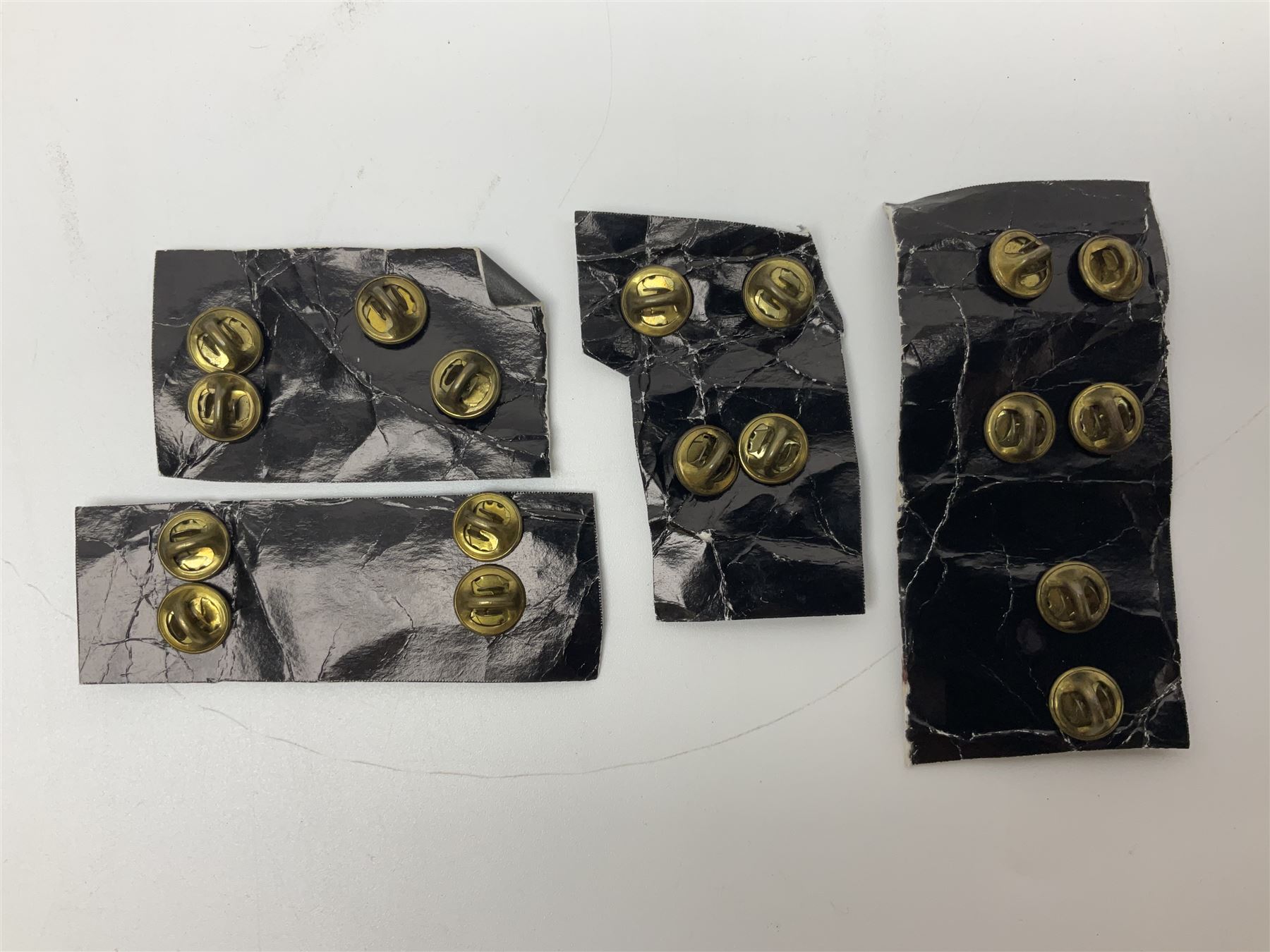 Fifty US rank badges and trade badges; WW2 and Vietnam period; predominantly on sale cards