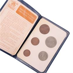Approximately 270 grams of Great British pre-1947 silver coins, Queen Victoria 1898 silver half crown, King George V South Africa 1935 two and a half shillings, 1812 Hull Lead Works penny, further Great British pre-decimal coins, and commemorative crowns