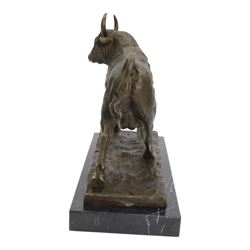 Bronze figure, modelled as a prancing bull, signed Milo, upon a marble rectangle base, base W36cm 