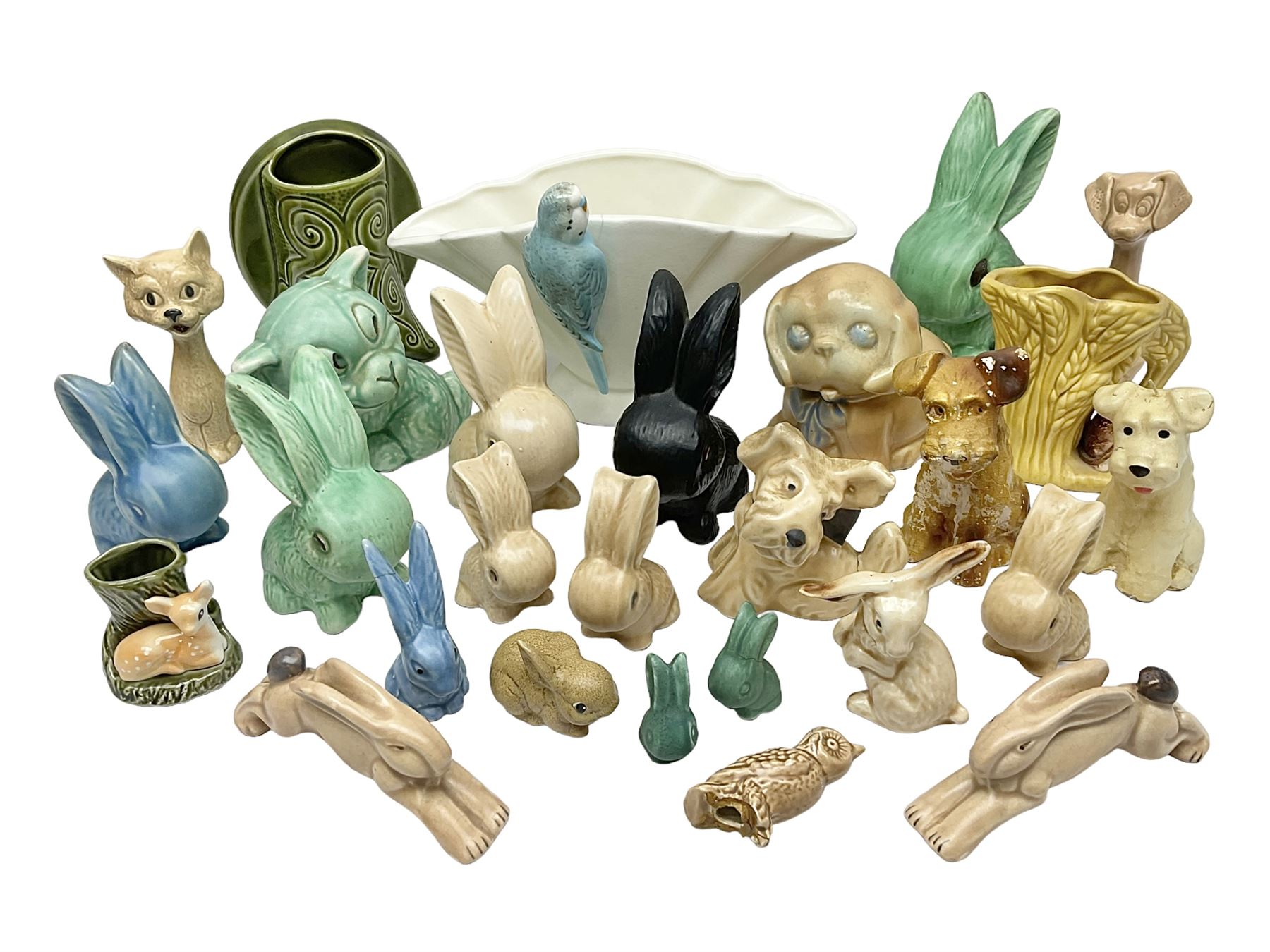 Collection of Sylvac and similar animal figures, including rabbits, hares and dogs, together with Falcon budgie vase, etc 