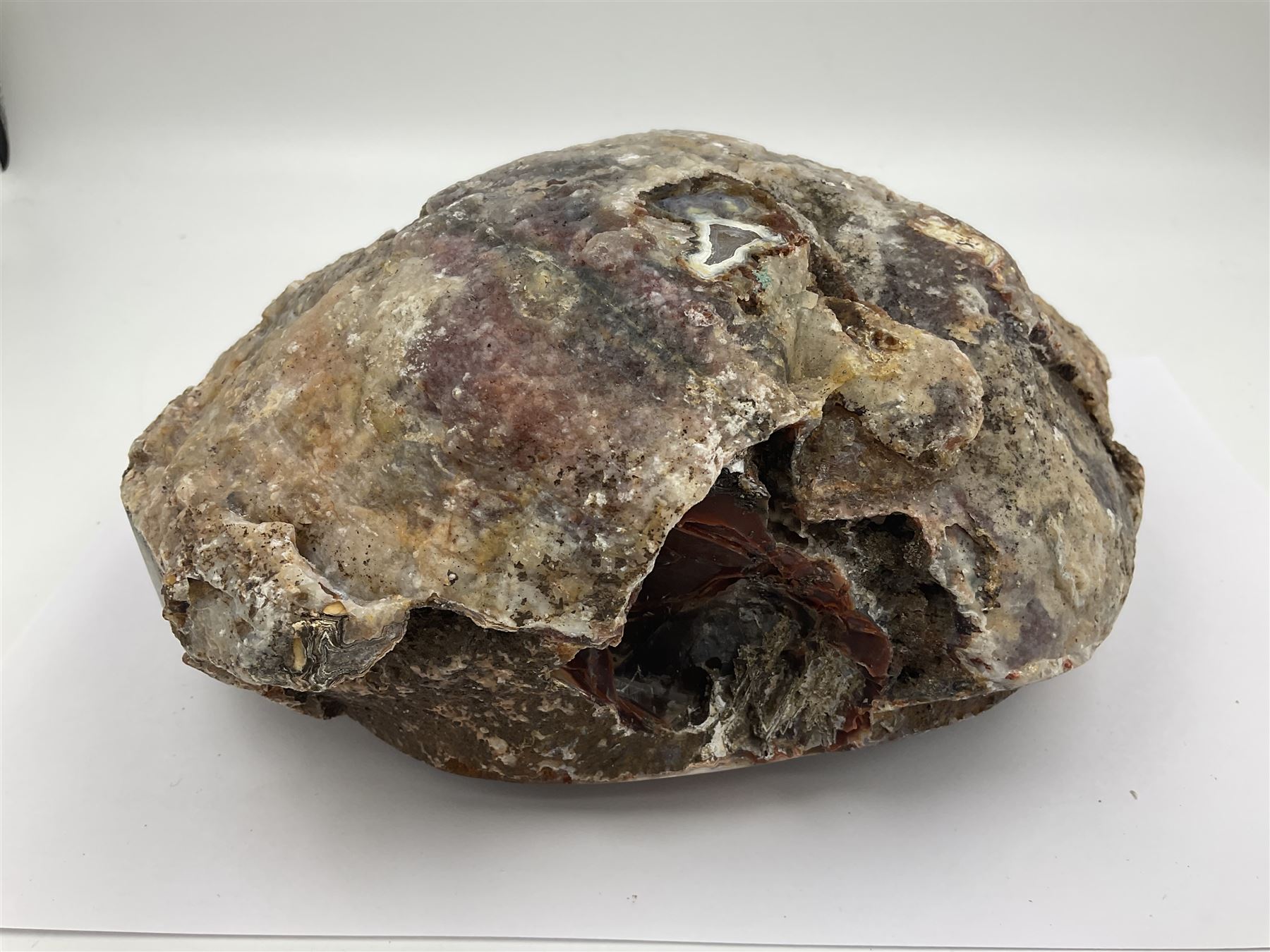 Amethyst crystal geode cluster, with well-defined crystals of various sizes, L22cm