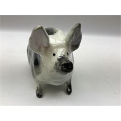 Early 20th century Wemyss seated pig, in black and white colouring, impressed mark beneath